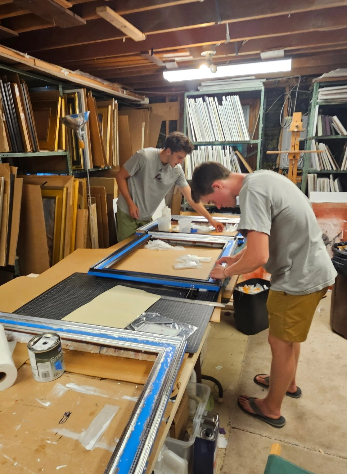 Liam and Jack Tindall working in the frame shop
